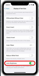 2. Now select display and text size to enter into the new tab and scroll down to find auto brightness to enable the toggle.